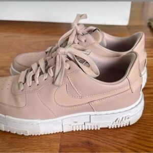 Nike Pink and White Sneakers with Geometric Sole